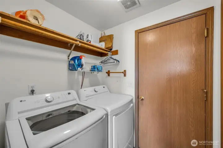 Unit #15332. Laundry room. Washer & dryer stay.