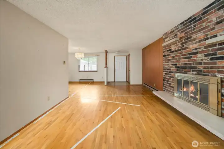 Looking back toward the front door and the dining room to the left of it.
