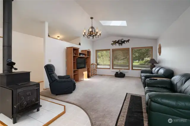 Step inside to an open living space and a large wood stove that will warm you to your core on even the coldest of days!