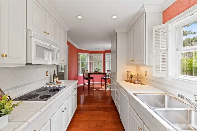 Large galley kitchen with breakfast nook