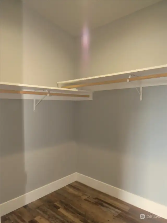 VIEW OF THE WALK-IN CLOSET WITH MAXIMUM STORAGE!