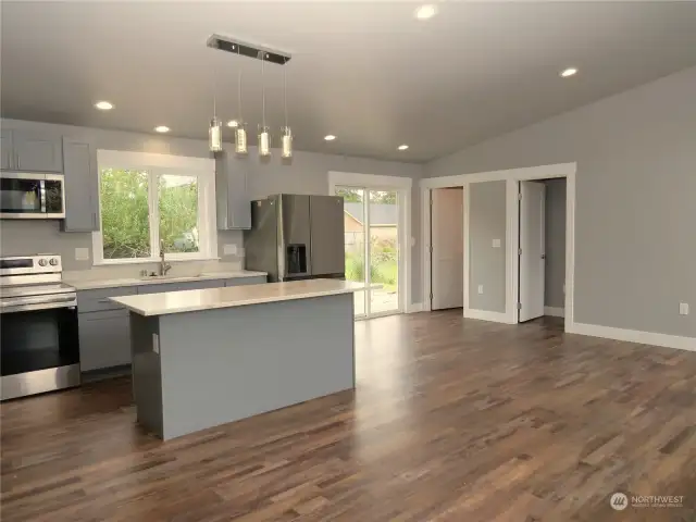 GOING BACK THROUGH THE LIVING AREA TOWARDS THE OTHER BEDROOM AND BATH!