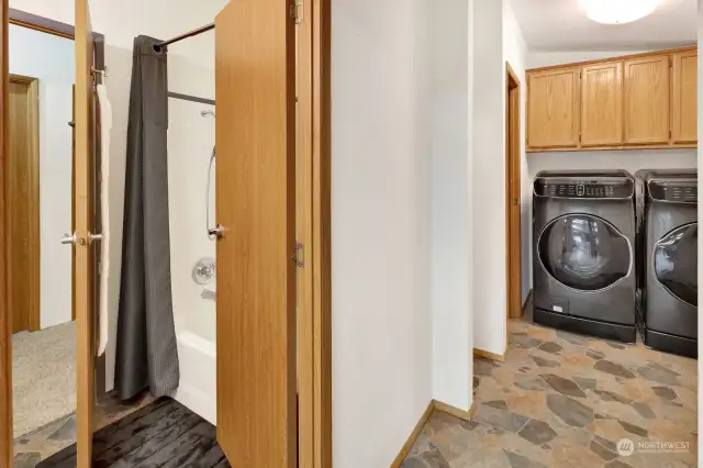 Full bath and laundry area
