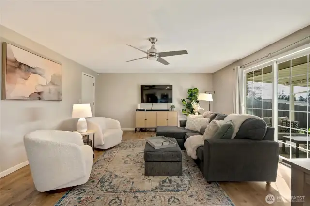 2 living room areas for added convenience. White door on left leads to 2-car attached garage