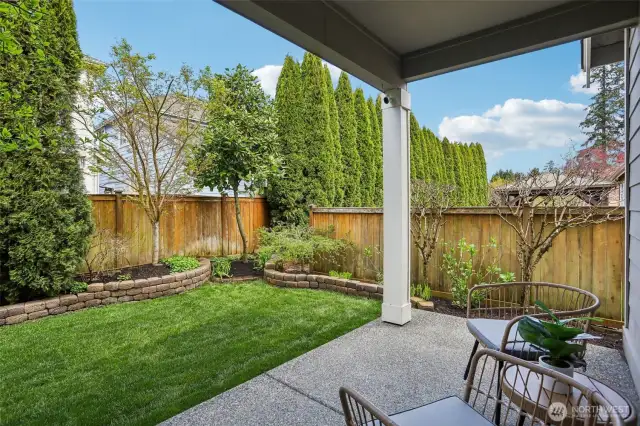 Enjoy gathering on the covered patio off the kitchen