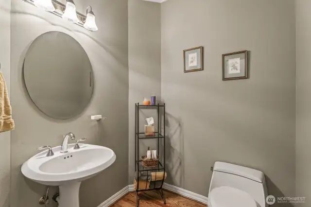 The main floor is completed with the guest ½ bath and laundry room with lots of cabinets and a utility sink.