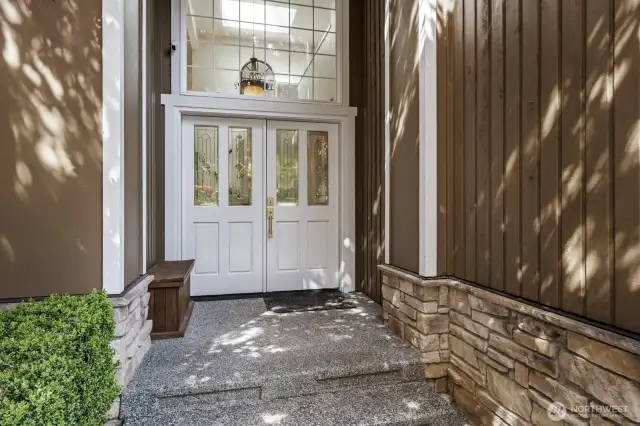 The double door entry opens into the voluminous wainscoted foyer with an oversized skylight and updated stairway.