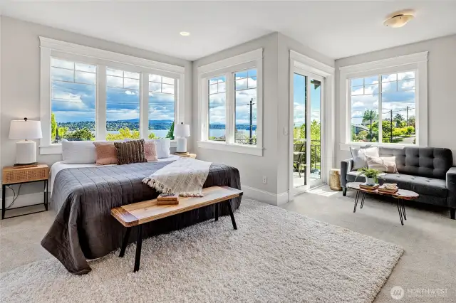 Primary en suite with a view deck and sitting area.
