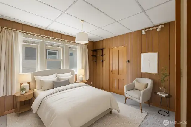 Primary Bedroom - located on the main level with bathroom access and walk-in closet.     This image has been virtually staged to show the potential of the space.