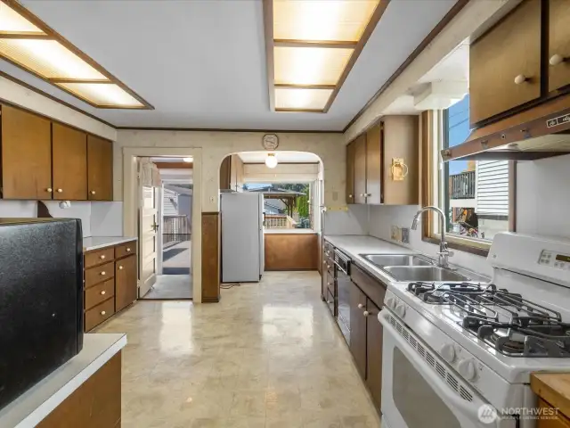 Large eat-in kitchen. Breakfast nook towards the back overlooks deck and backyard.
