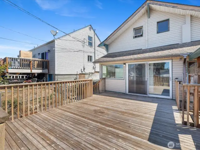 Step outside to a large, entertainment-ready deck that looks out over the backyard—an ideal spot for hosting friends, soaking up the sun, or creating your own outdoor retreat.