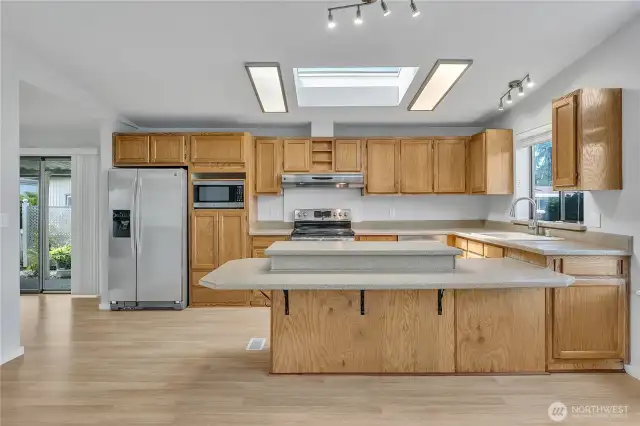 Island provides additional eating space in the kitchen