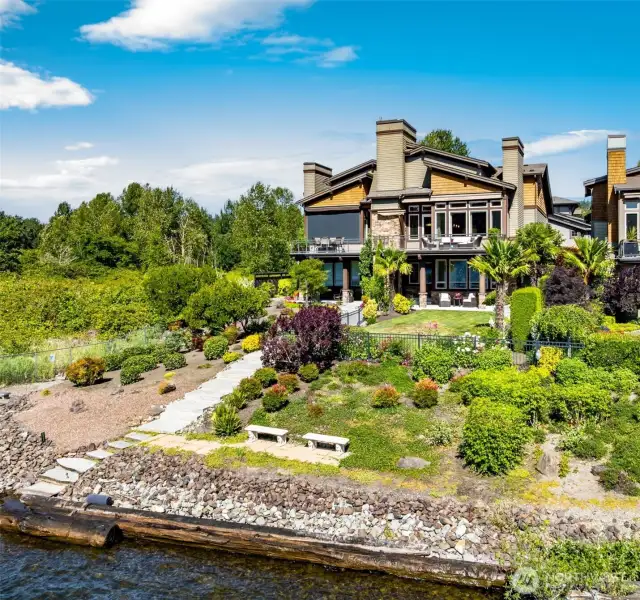 Immaculate landscaping down to waterfront