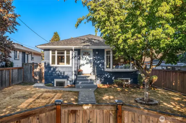 Such a sweet mid-century home on a beautiful street!