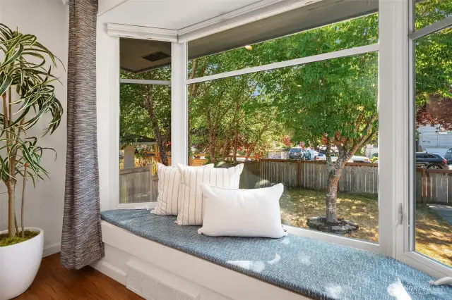 The window seat is the perfect place to sit and watch the passerby's.