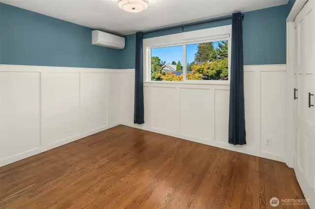 Bedroom #2 on the main level. The wainscoting is adorable.