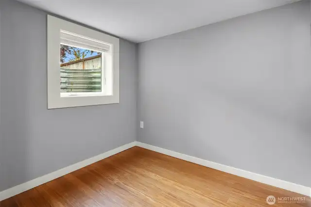 The 5th bedroom with new conforming window. The built-in closet is just out of view.