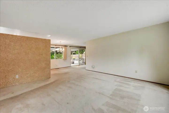 Living Room looking through to the patio and Rec room.