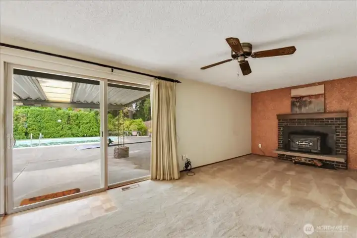 Rec Room with wood burning fireplace insert.