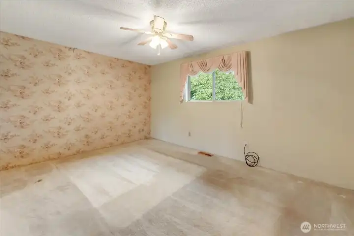 Primary Bedroom with suggestion as to where you might set up the bed?