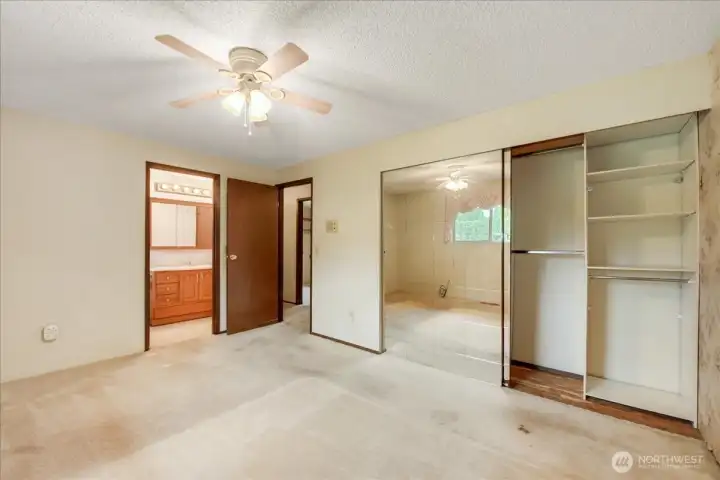 Primary Bedroom with large closet and separate entrance to the Bathroom.