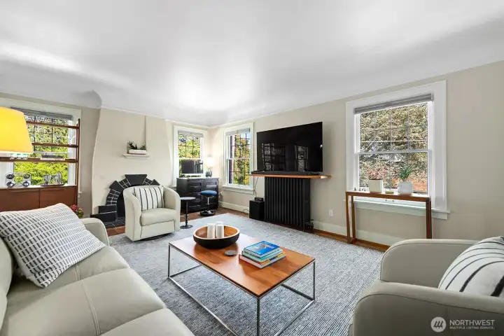 Hardwood floors, leaded-glass windows, and excellent natural light.