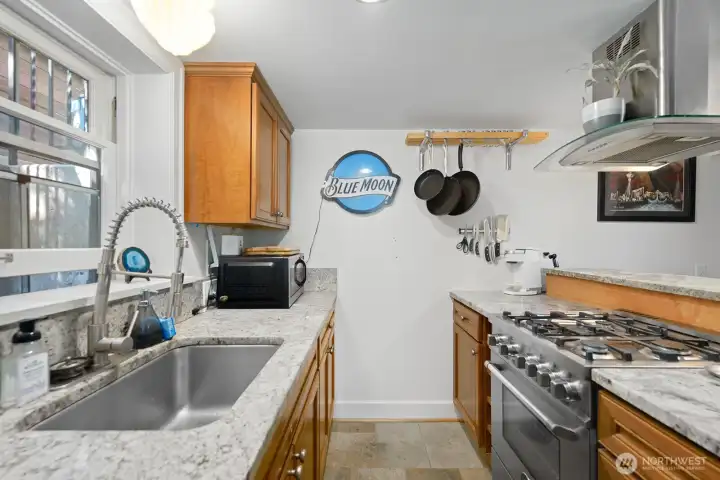 Nonconforming basement unit kitchen, previously used as the Inn Keepers Quarters for breakfast prep.