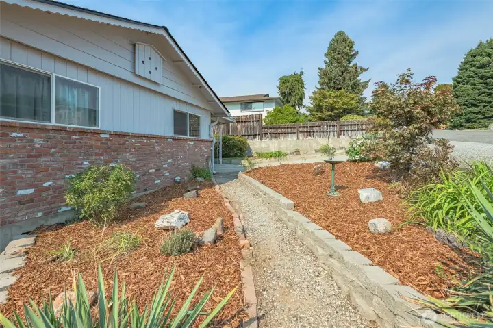 Landscaped with fresh bark.