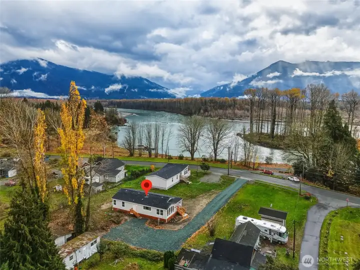 This charming home is nestled at the foothills of nature, offering a tranquil and picturesque setting for those seeking a peaceful escape from the everyday hustle and bustle, allowing residents to fully immerse themselves in the serenity of the natural surroundings.