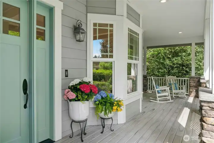 Beautiful Covered Wrap around porch with vinyl railings. Beautiful Covered Wrap around porch with vinyl railings.