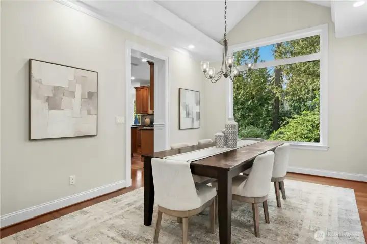 Formal dining room with cove lit ceiling. Formal dining room with cove lit ceiling.