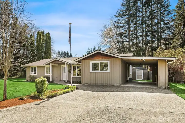 Carport and shed (carport has a door into the house -- no need to get those groceries wet!