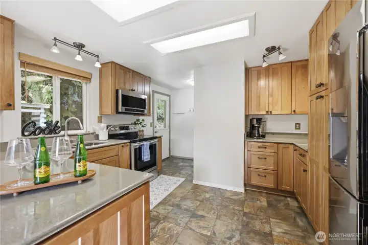 Kitchen featuring ample cabinetry, counter space, and functional layout