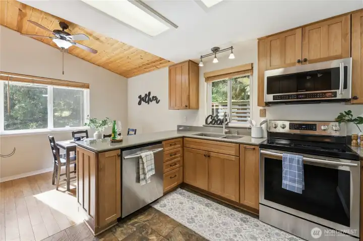 Additional kitchen angle highlighting workspace and flow