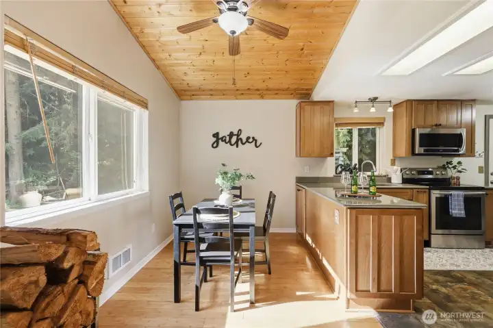 Dining area with natural light and convenient access to the kitchen