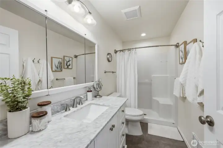 Updated bathroom with modern vanity and clean finishes