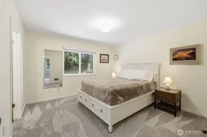 Secondary primary bedroom with flexible use for guests