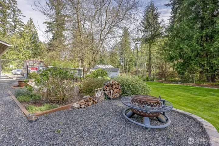 Outdoor firepit area perfect for relaxing and entertaining
