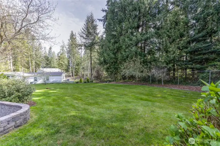 Additional yard view emphasizing usable outdoor space and privacy