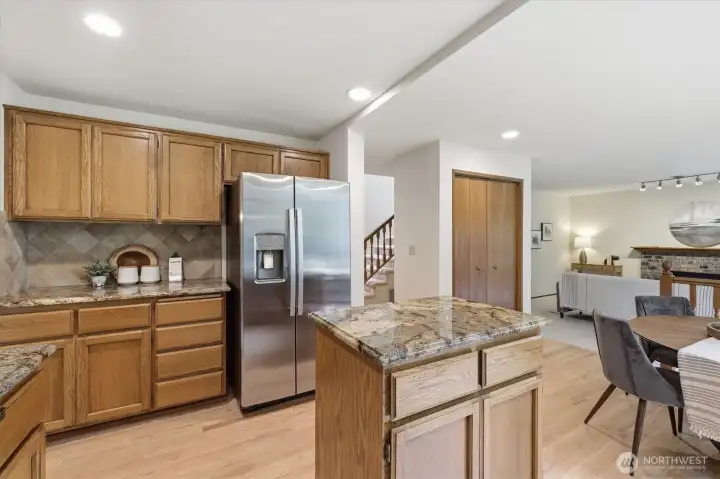 The kitchen has tons of cabinetry for storage. Loving pride of ownership is evident at every turn!