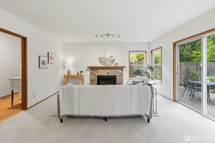 The family room has great size and is easy to furnish as you wish. Also pictured is the door to the laundry room/mud room.