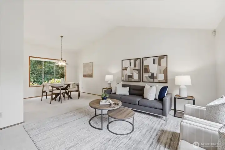 The dining and living rooms have a beautiful vaulted ceiling and combine to create a wonderfully open and comfortable space.