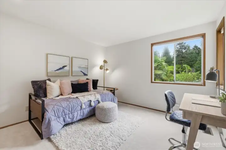 This is the third of three upstairs bedrooms.
