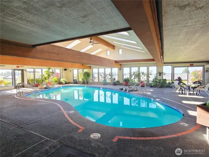 Pool features a 9' pool and separate hot tub.