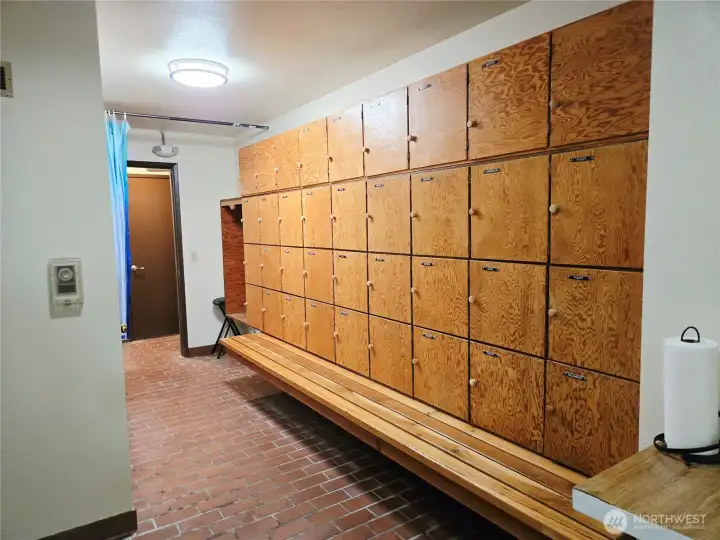 Pool house locker rooms for men & women, with showers.