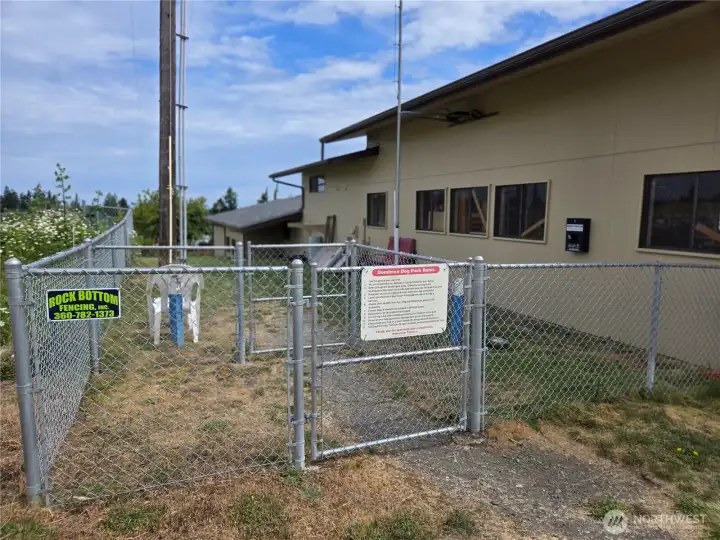 Enclosed dog run provides additional safe space for your four legged friend to run and play.