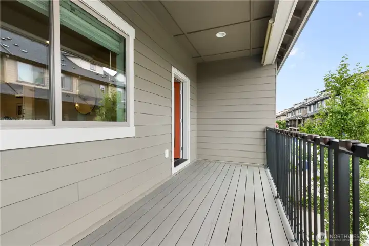 A covered overed deck extends the living space all summer long.
