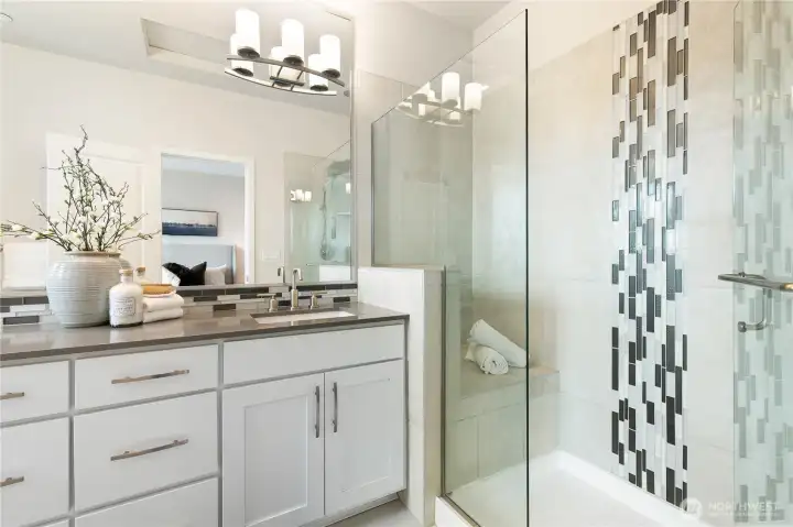 Spa-like bath with convenient in shower bench