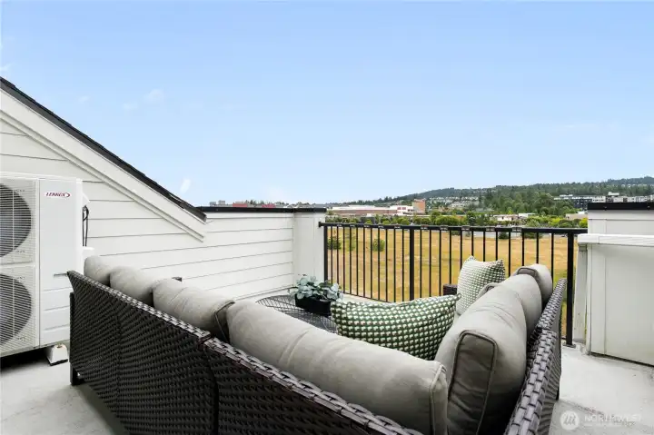 Rooftop deck that elevates your entertaining  -unwind, and take in the evening skies.