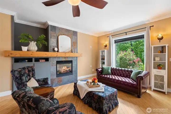 Livingroom with gas fireplace and large mantel
